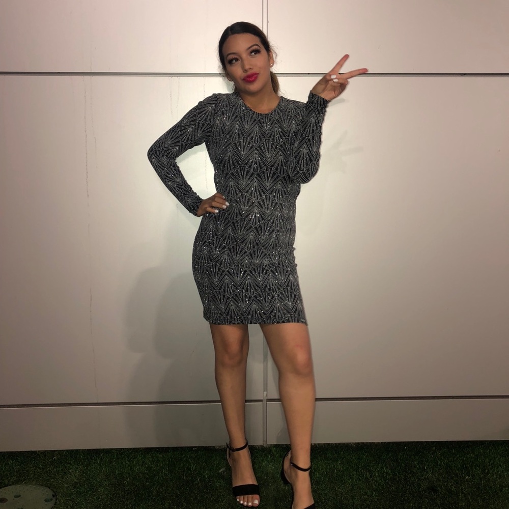 A cute sparkly dress. Only worn once